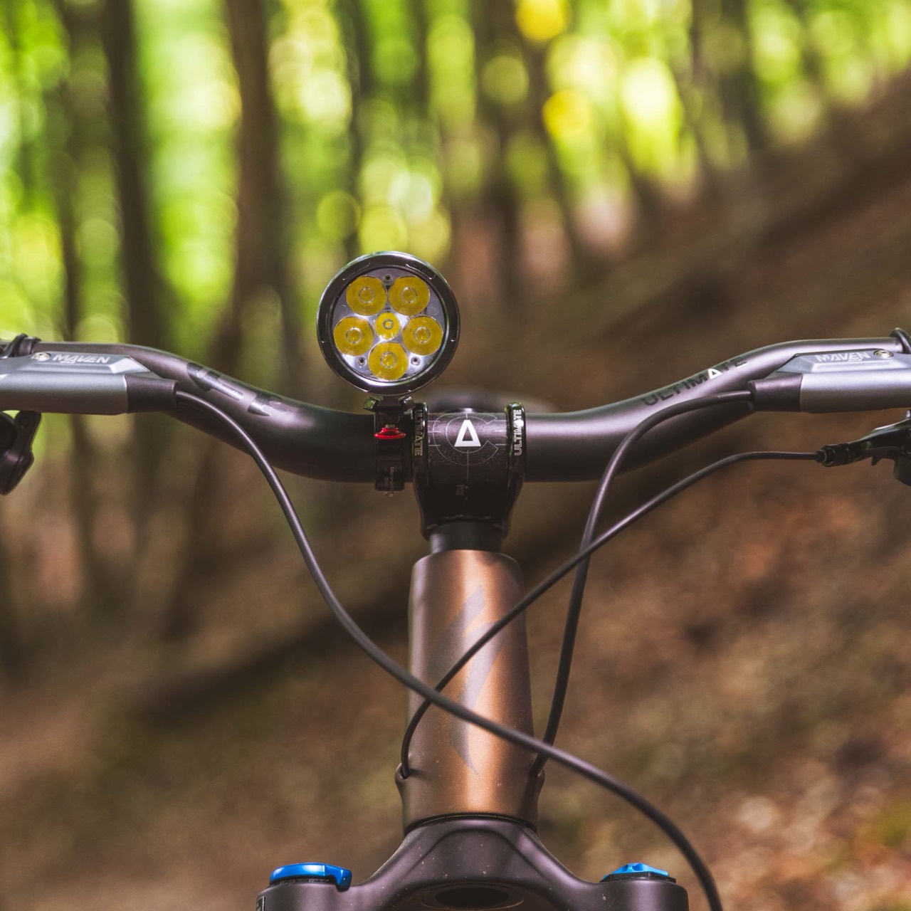 Exposure Six Pack 15 mounted on a mountain bike
