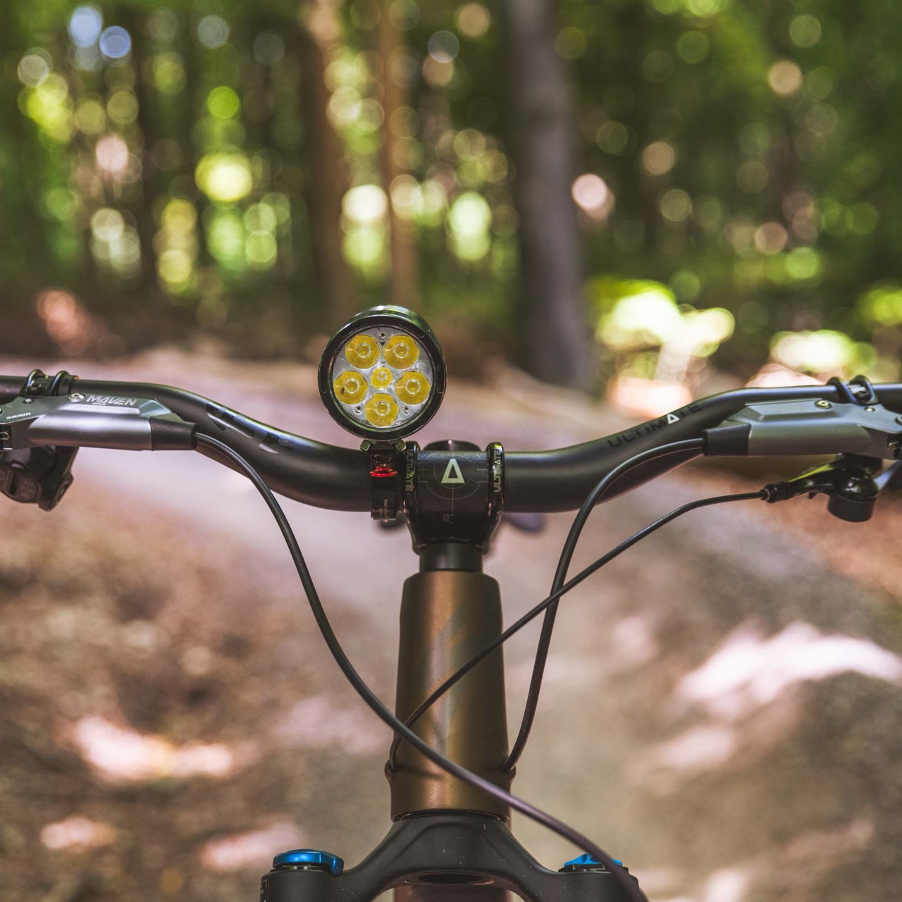 Exposure Six Pack 15 mounted on a mountain bike